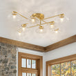 Load image into Gallery viewer, 8-Light Sputnik Artisan Water Glass Oval Globe Brass Semi Flush
