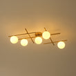 Load image into Gallery viewer, Brass 5-Light Linear Opal Glass Globe Sputnik Semi Flush
