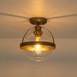Load image into Gallery viewer, Mid-Century Brass Single Clear Glass Globe Ceiling Light
