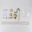 Load image into Gallery viewer, Vintage Brass 3-Light Candle Style Clear Glass Globe Pendant
