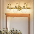 Load image into Gallery viewer, Farmhouze Light-Mid-Century 3-Light Clear Glass Globe Vanity Wall Sconce-Wall Sconce-Brass-
